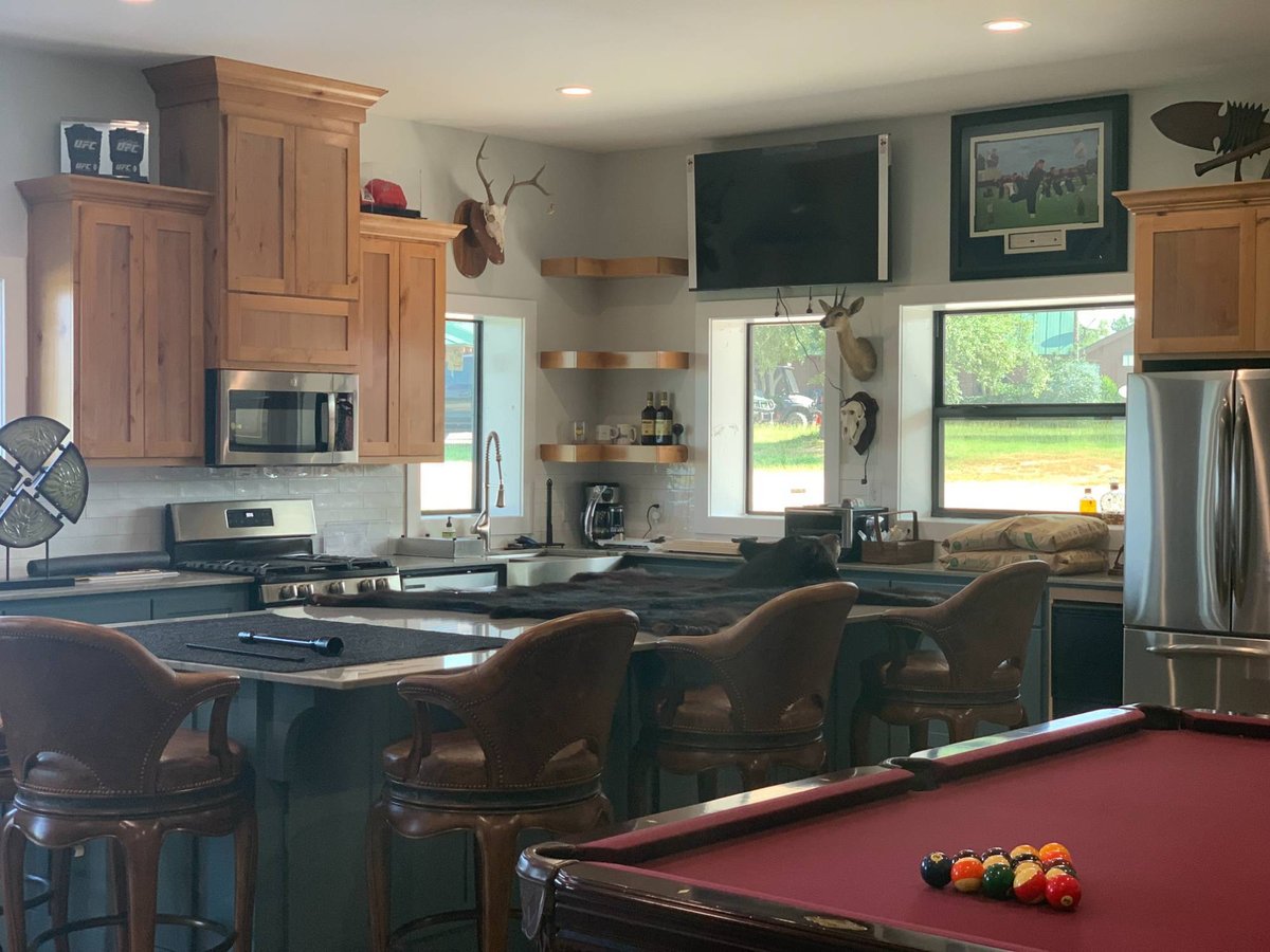 Open-concept barndominium kitchen and entertainment area built by Wonderview Home Services in Navasota, Texas.-optimized