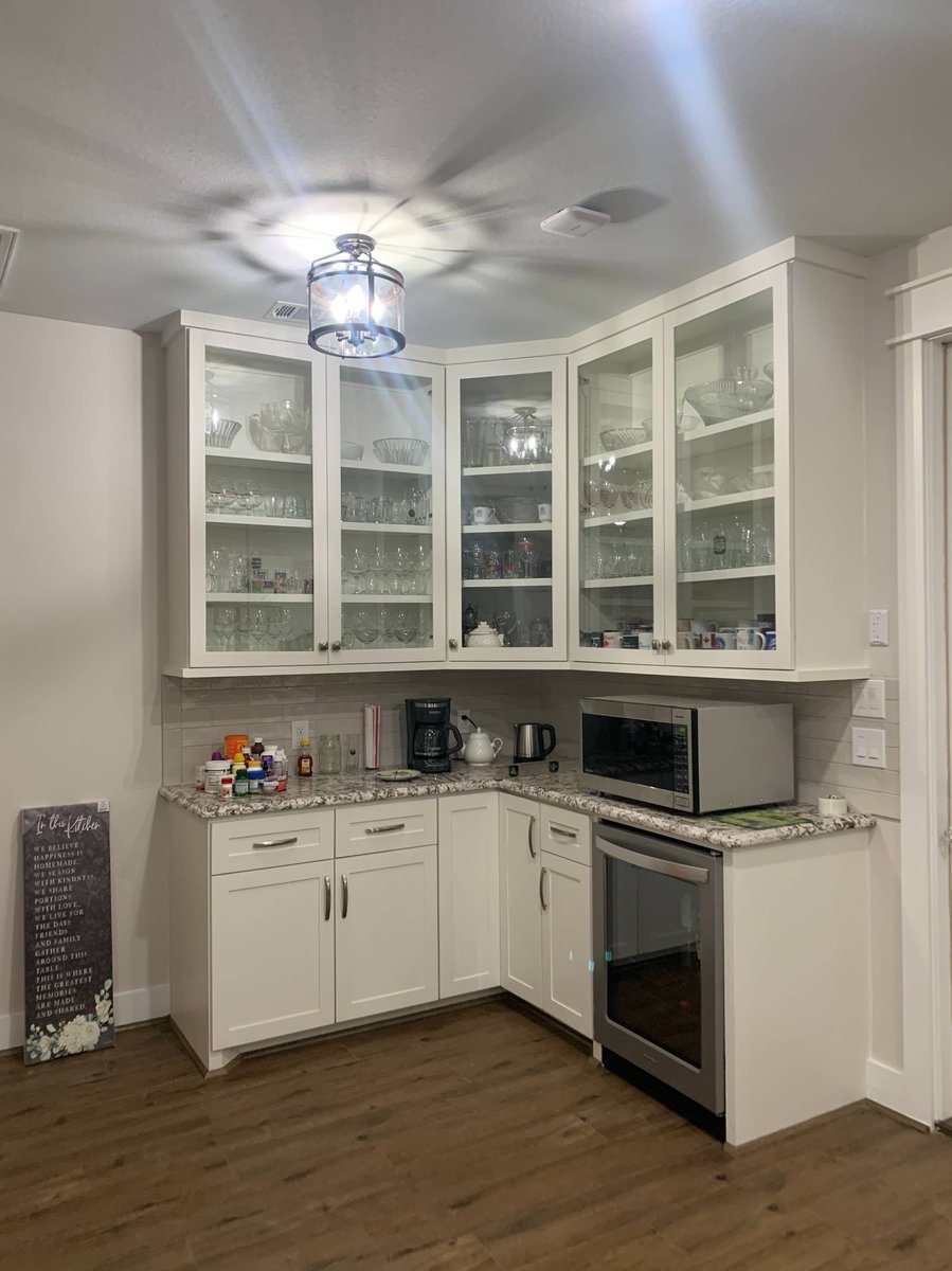 Custom built-in beverage station by Wonderview Home Services in a Magnolia, TX residential new construction home.-optimized