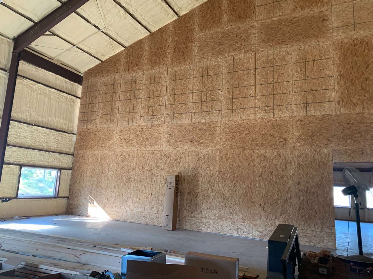 Interior framing and insulation progress for a commercial new construction project by Wonderview Home Services in New Waverly, T