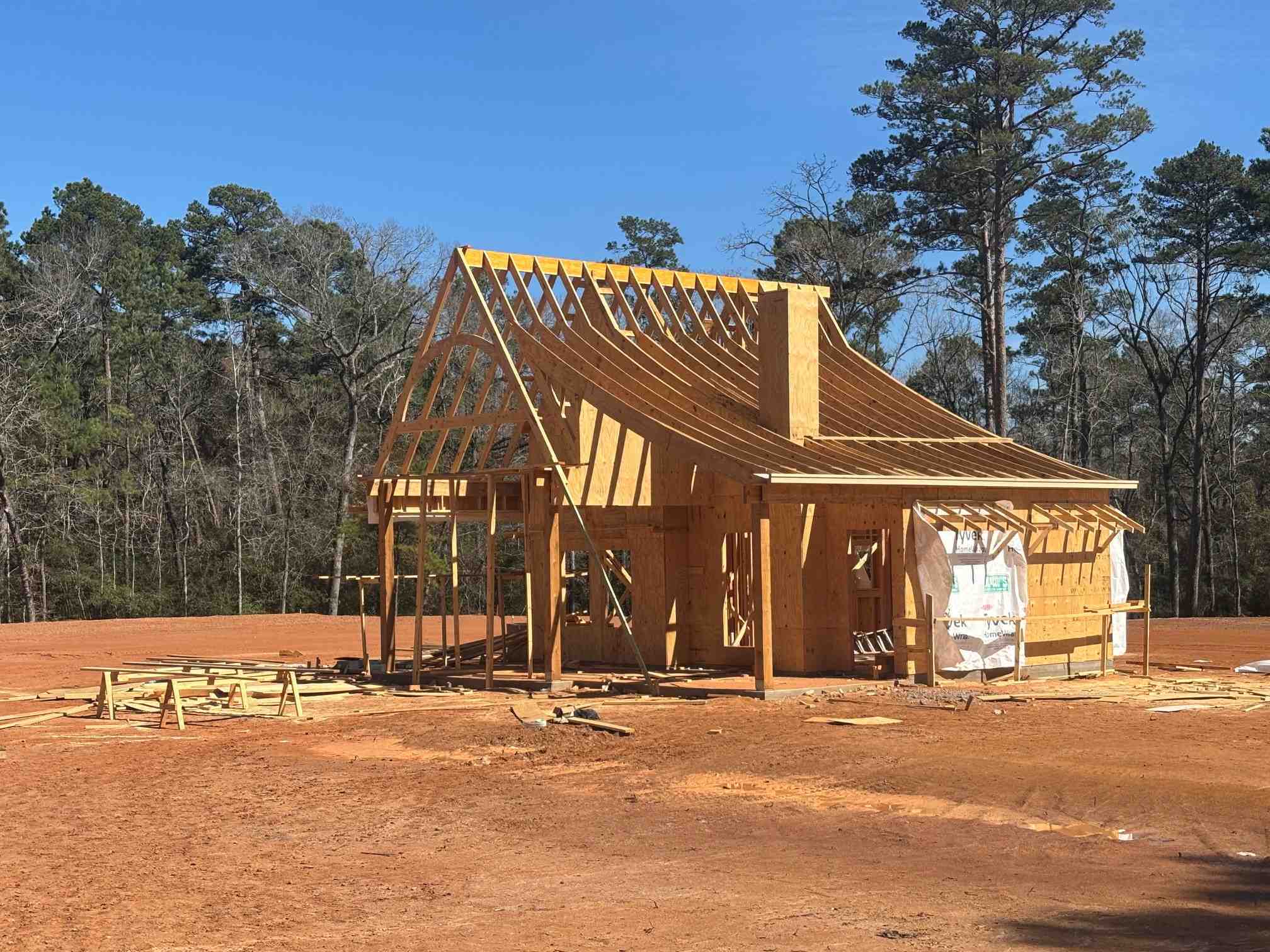 Image of the frame of a custom home being built in the Houston area by Wonderview
